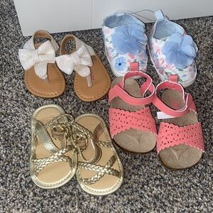 4 pairs of  New Baby girl shoes